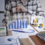 businesspeople working finance accounting analyze financi scaled.jpg